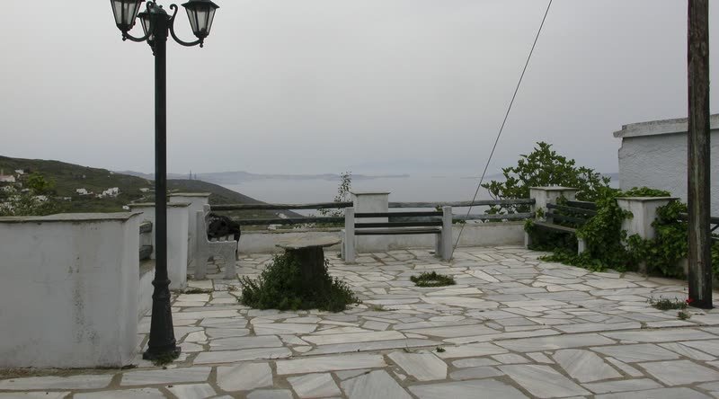 Marble-paved Cycladic alley with sea view, Paros